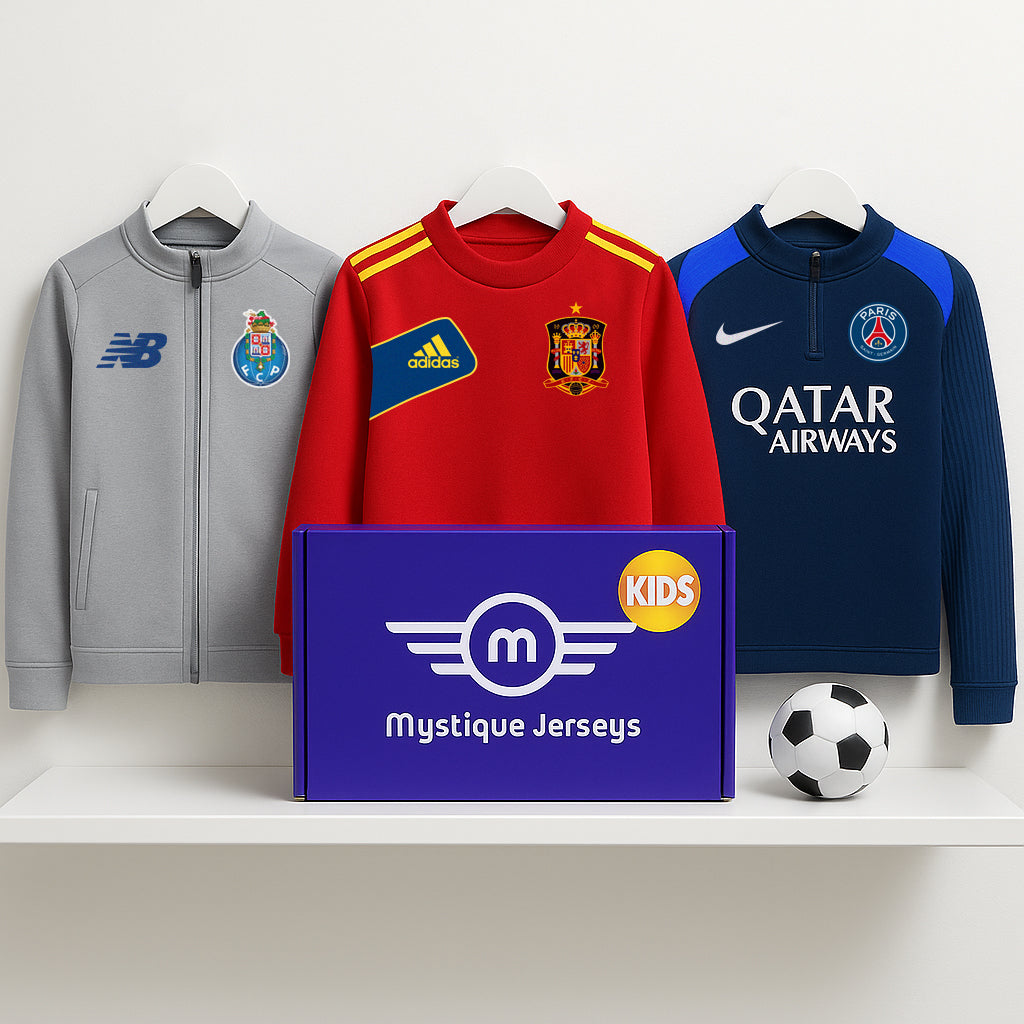 Mystique Jerseys kids mystery football box with authentic Porto jacket, Spain top, and PSG kids jacket alongside a football.